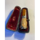 A SILVER AND AMBER CHEROOT HOLDER IN ORIGNAL PRESENTATION CASE