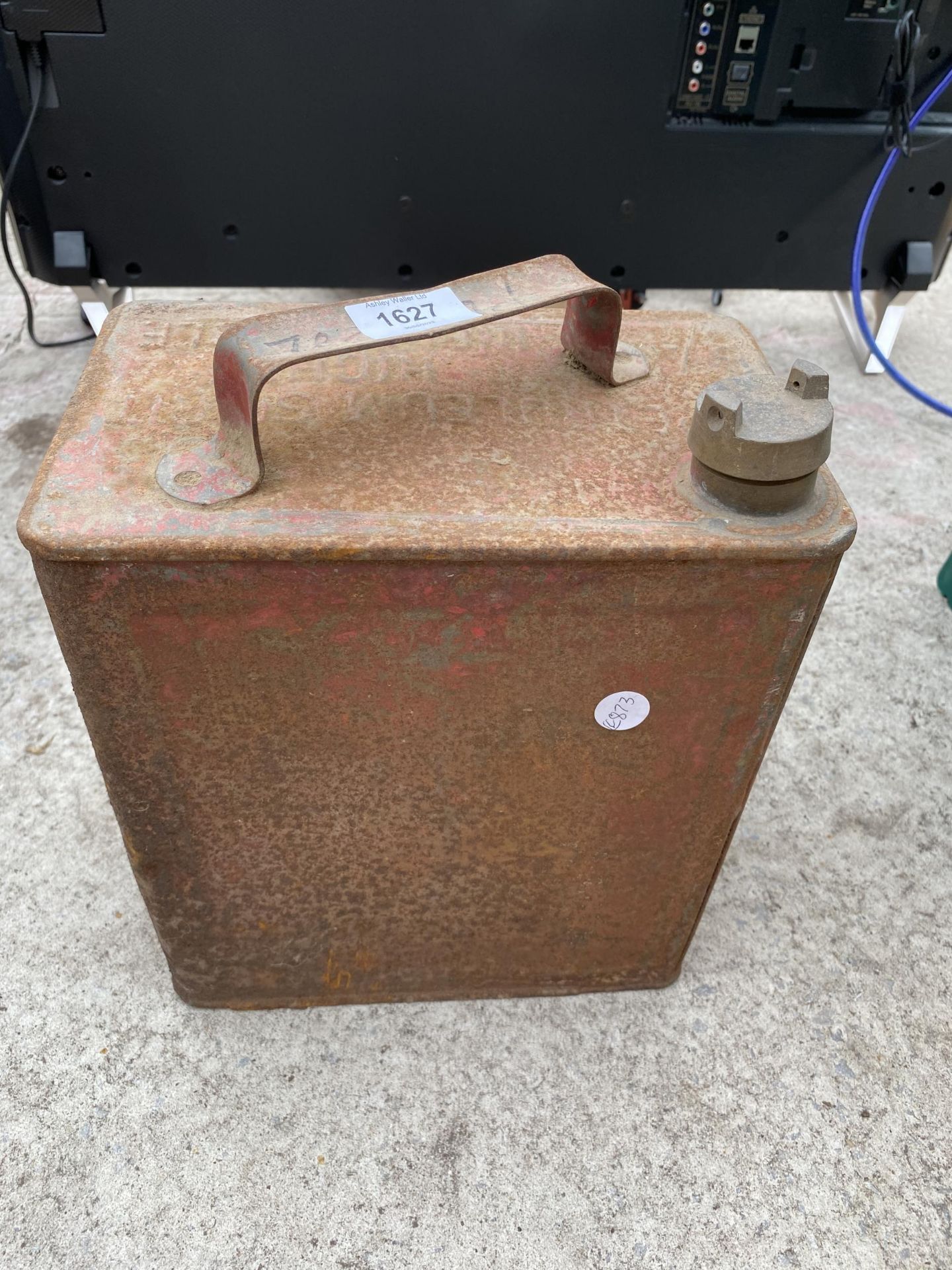 A VINTAGE FUEL CAN WITH BRASS CAP (HAS A HOLE)