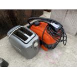 A STEAM CLEANER AND A TOASTER