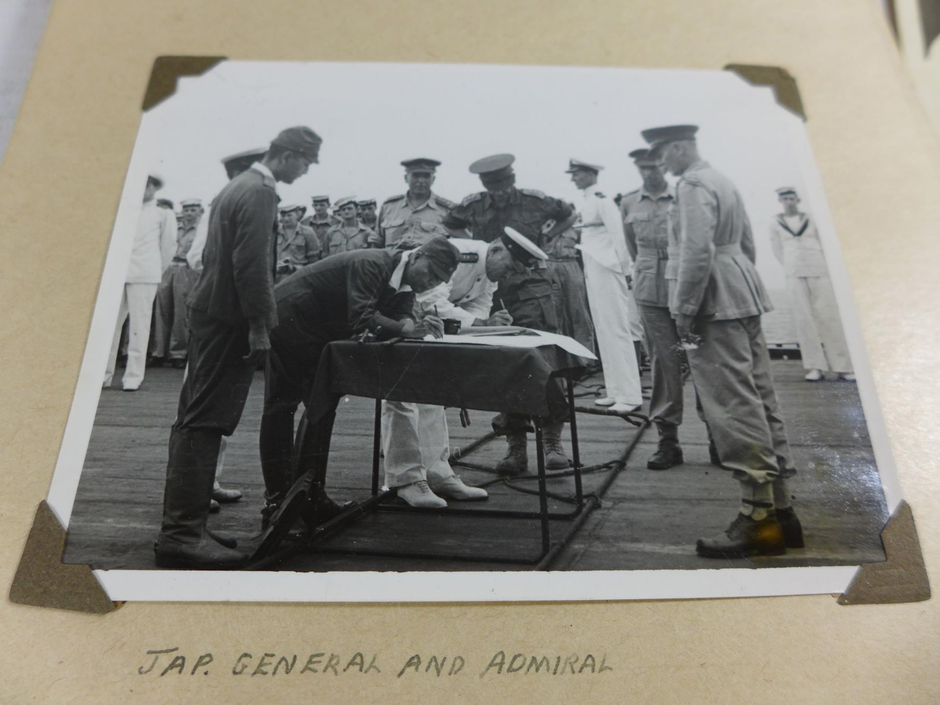 A WORLD WAR II PHOTOGRAPH ALBUM CONTAINING PHOTOGRAPHS OF THE JAPANESE SIGNING OF THE INSTRUMENT - Image 3 of 9
