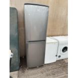 A SILVER ZANUSSI UPRIGHT FRIDGE FREEZER