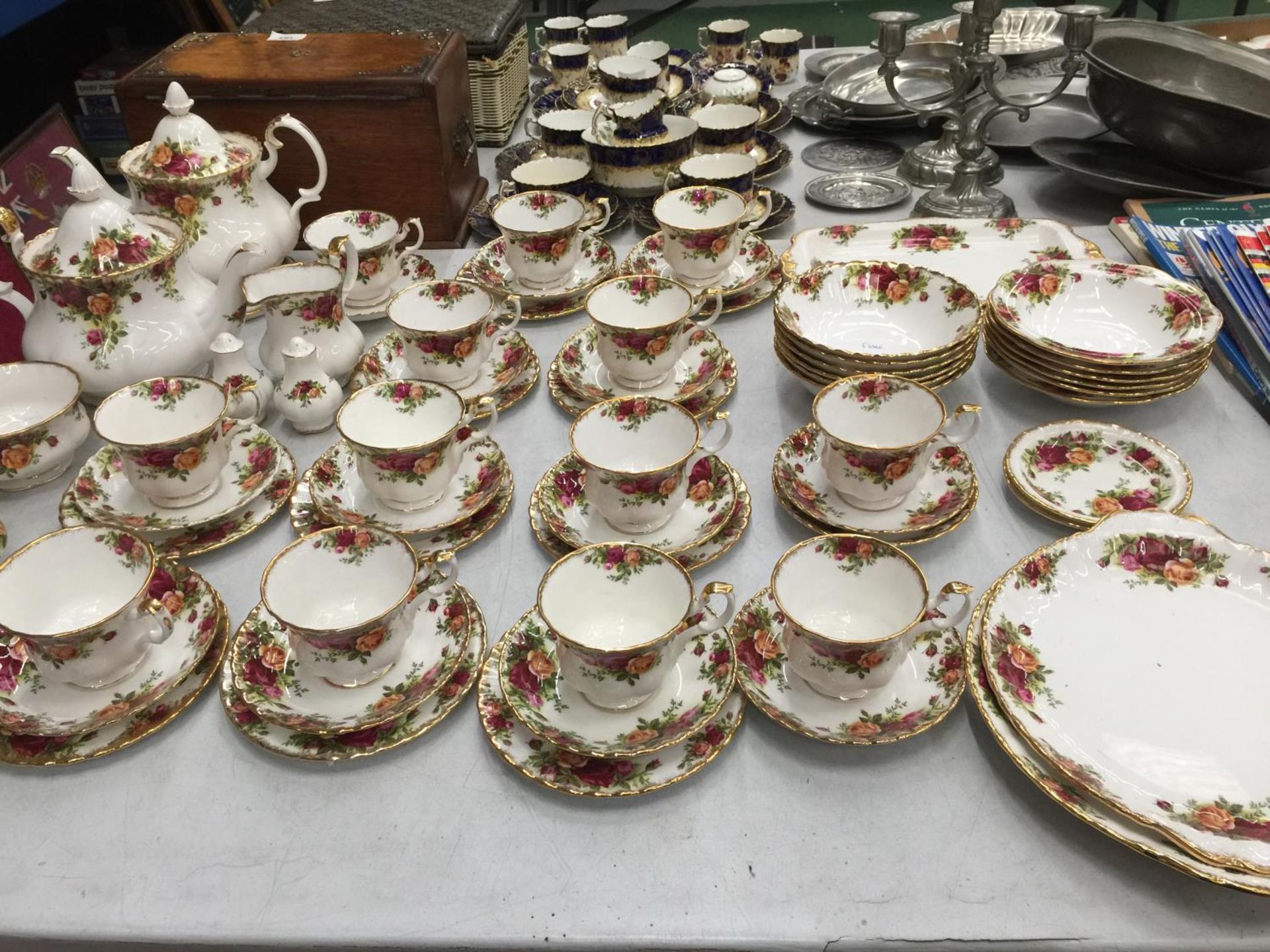 A LARGE QUANTITY OF ROYAL ALBERT 'OLD COUNTRY ROSES' TEAWARE TO INCLUDE TWO TEAPOTS, CAKE PLATES,