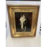 A GILT FRAMED PRINT OF A HORSE