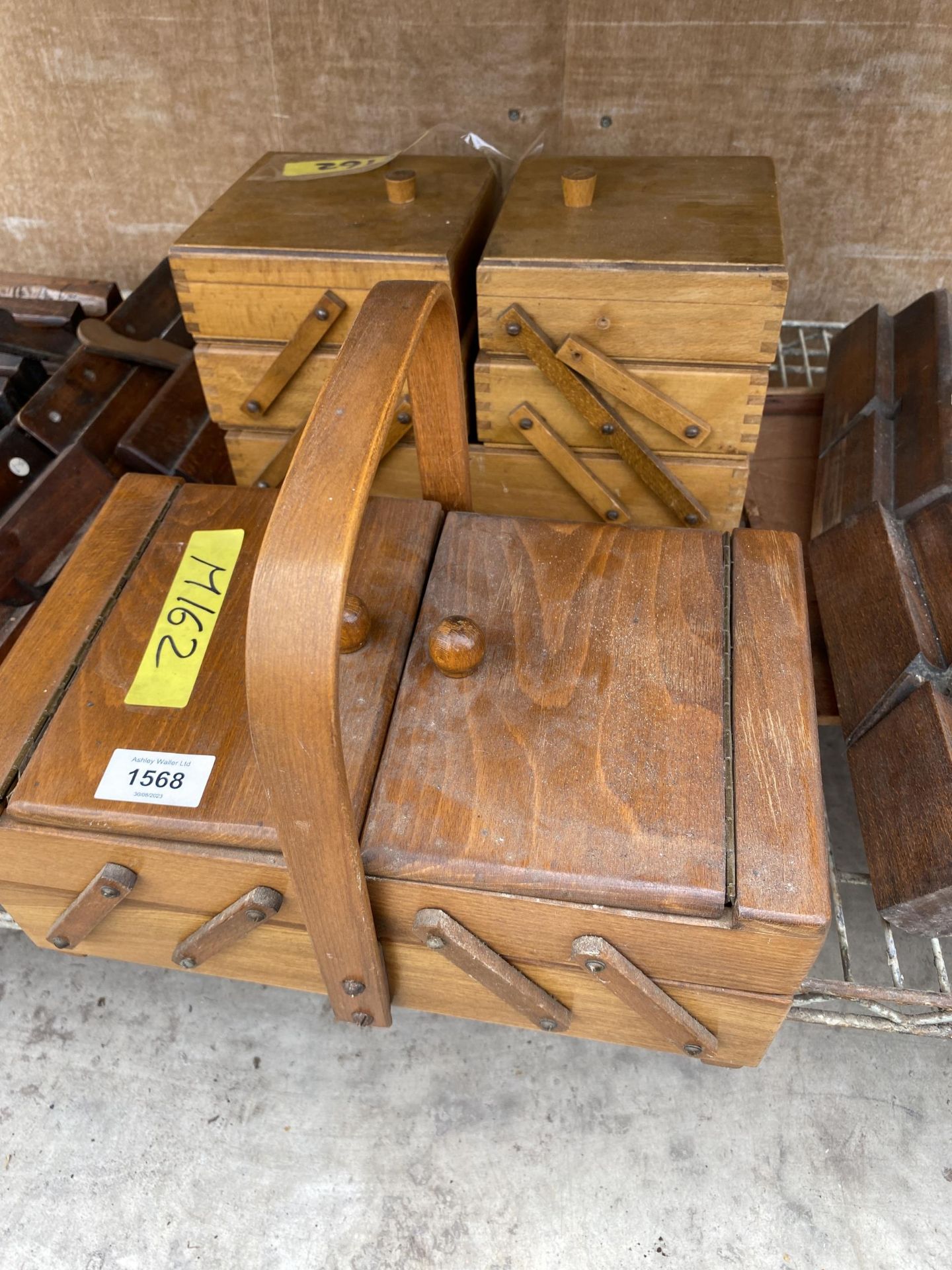 TWO WOODEN CONCERTINA SEWING BOXES