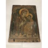 A 19TH CENTURY HAND PAINTED ICON OF THE MADONNA AND CHILD