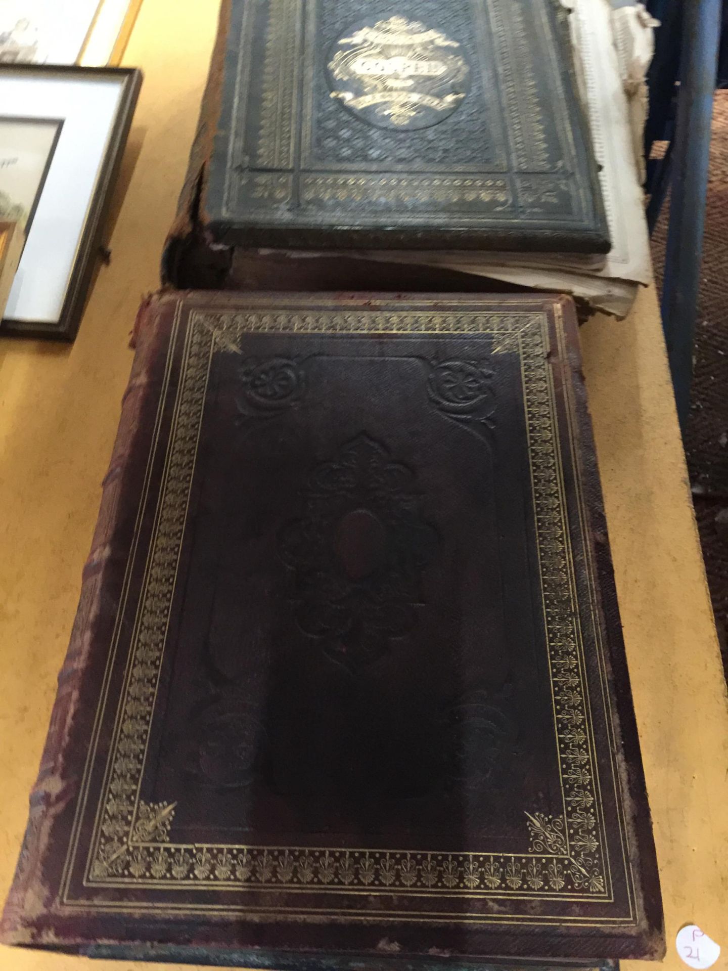 TWO LEATHER BOUND VINTAGE BIBLES