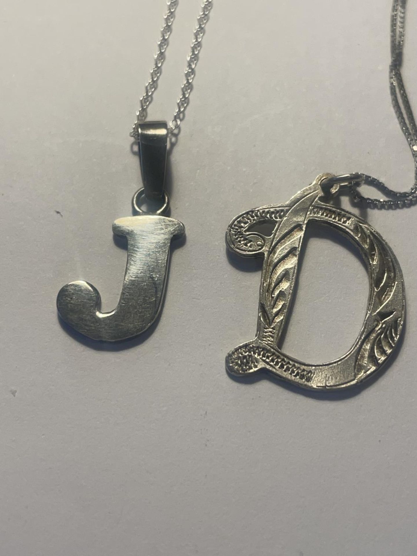 FOUR SILVER NECKLACES WITH PENDANTS - Image 2 of 3