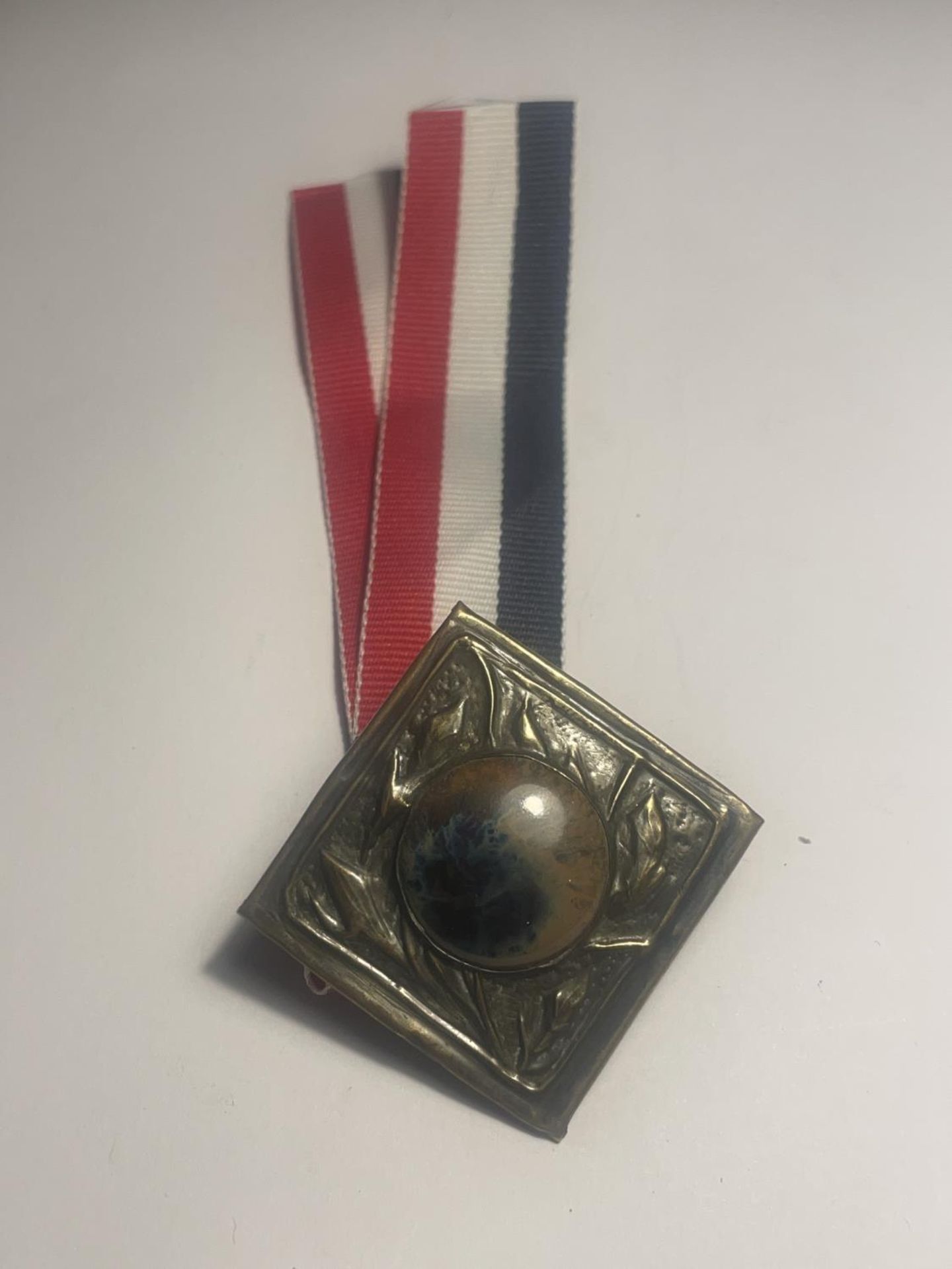 A RUSKIN ARTS AND CRAFTS MEDALLION