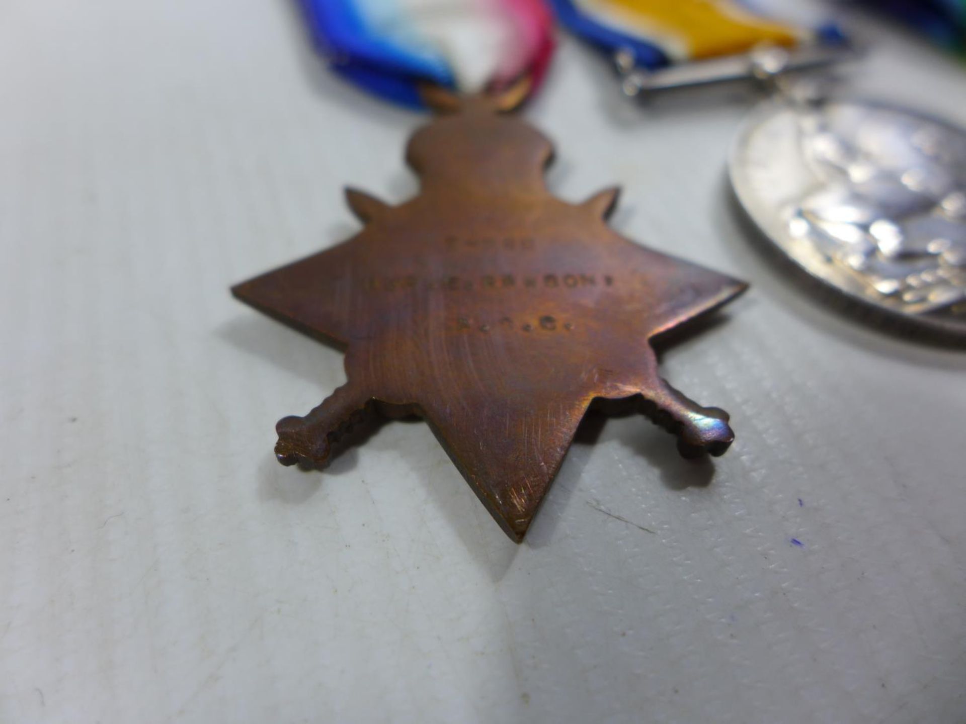 A WORLD WAR I TRIO MEDAL GROUP AWARDED TO 5-866 DRIVER E RAWSON OF THE ARMY SERVICE CORPS - Image 3 of 4