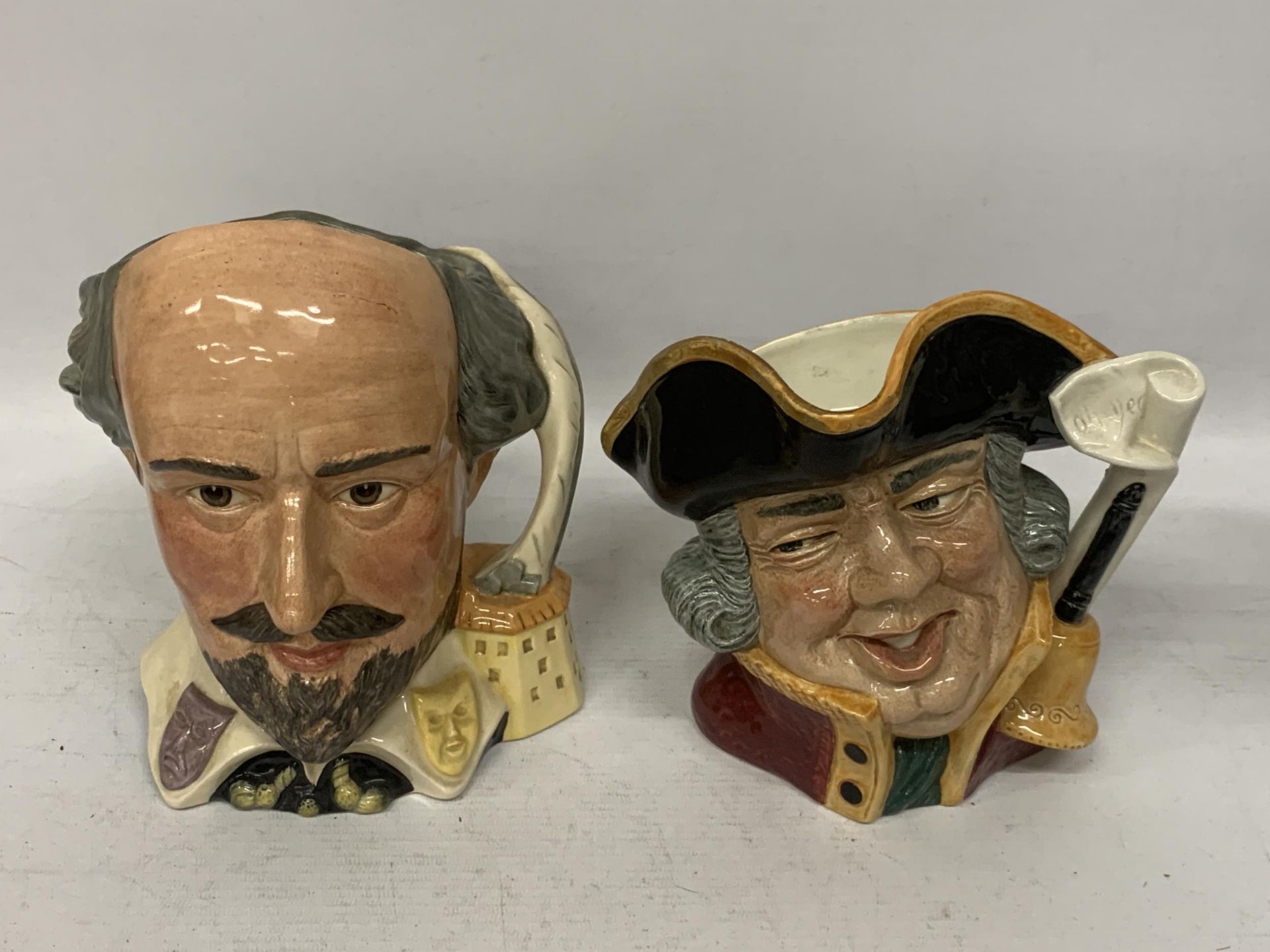 TWO ROYAL DOULTON CHARACTER JUGS - 'WILLIAM SHAKESPEARE' (SECONDS) & 'TOWN CRIER'