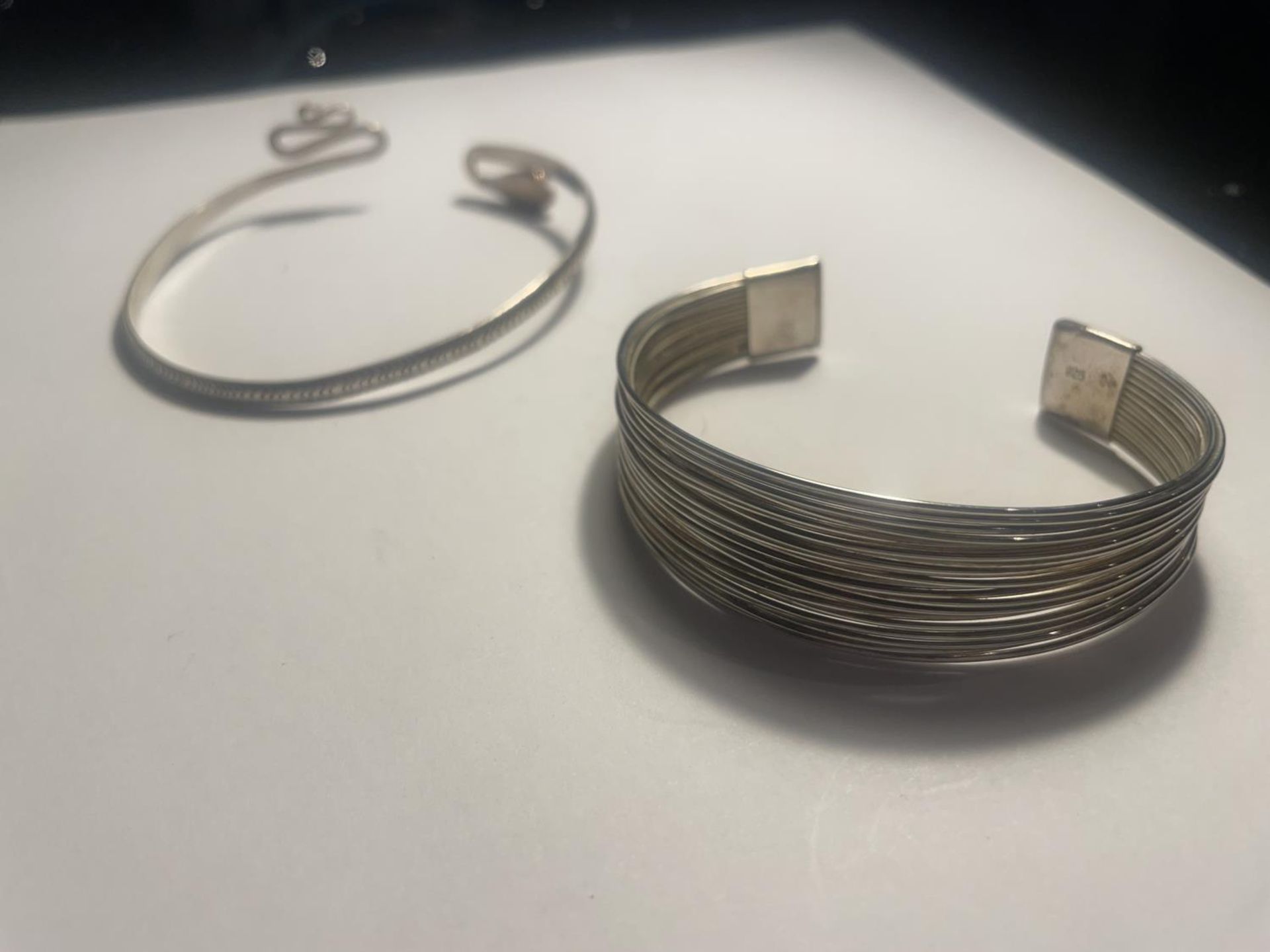 TWO SILVER BANGLES