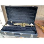 A VINTAGE BRASS TRUMPET BEARING THE STAMP 'DESIGNED BY VINCENT BACH MERCEDES II' COMPLETE WITH MOUTH