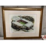 A GILT FRAMED OLD TRAFFORD MANCHESTER UNITED PRINT, PENCIL SIGNED