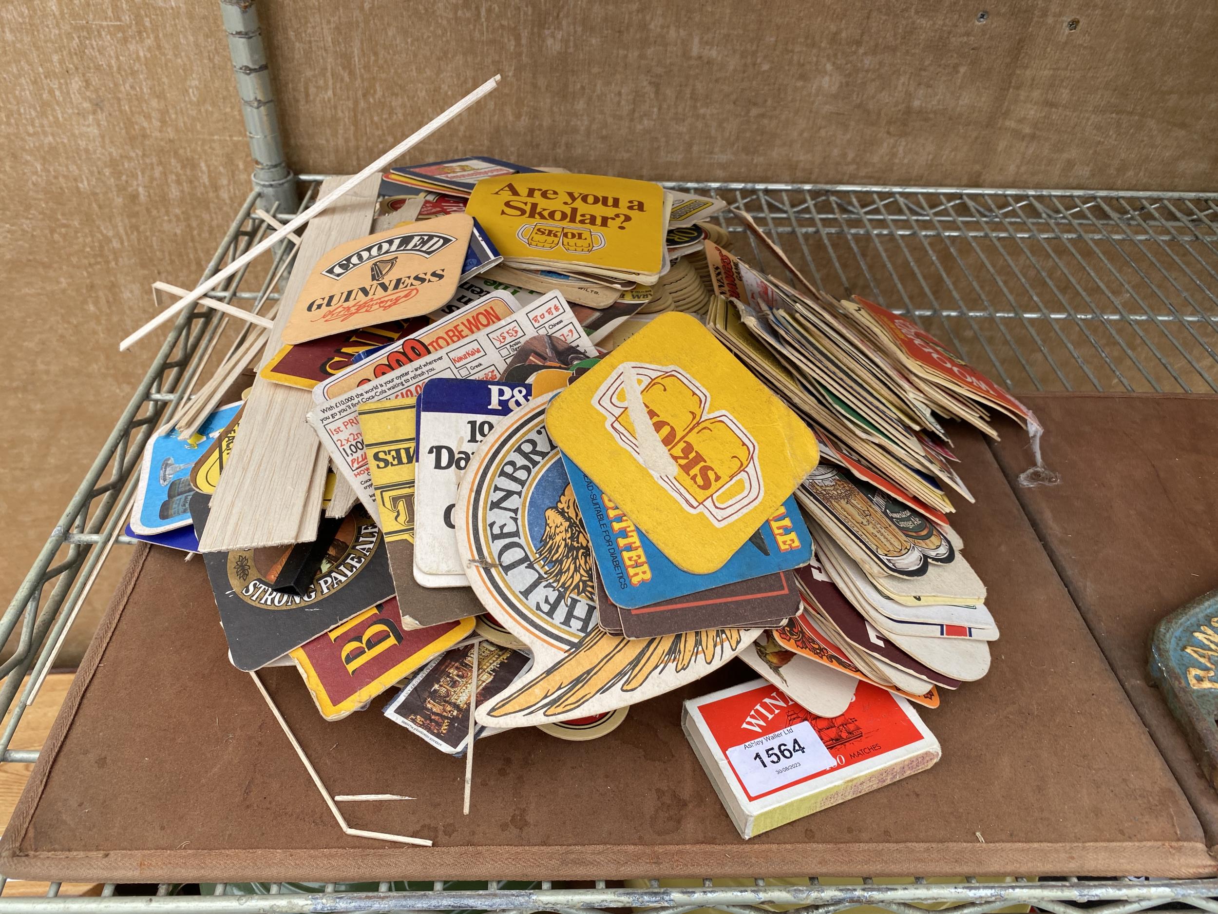 A LARGE ASSORTMENT OF VINTAGE BEER MATS