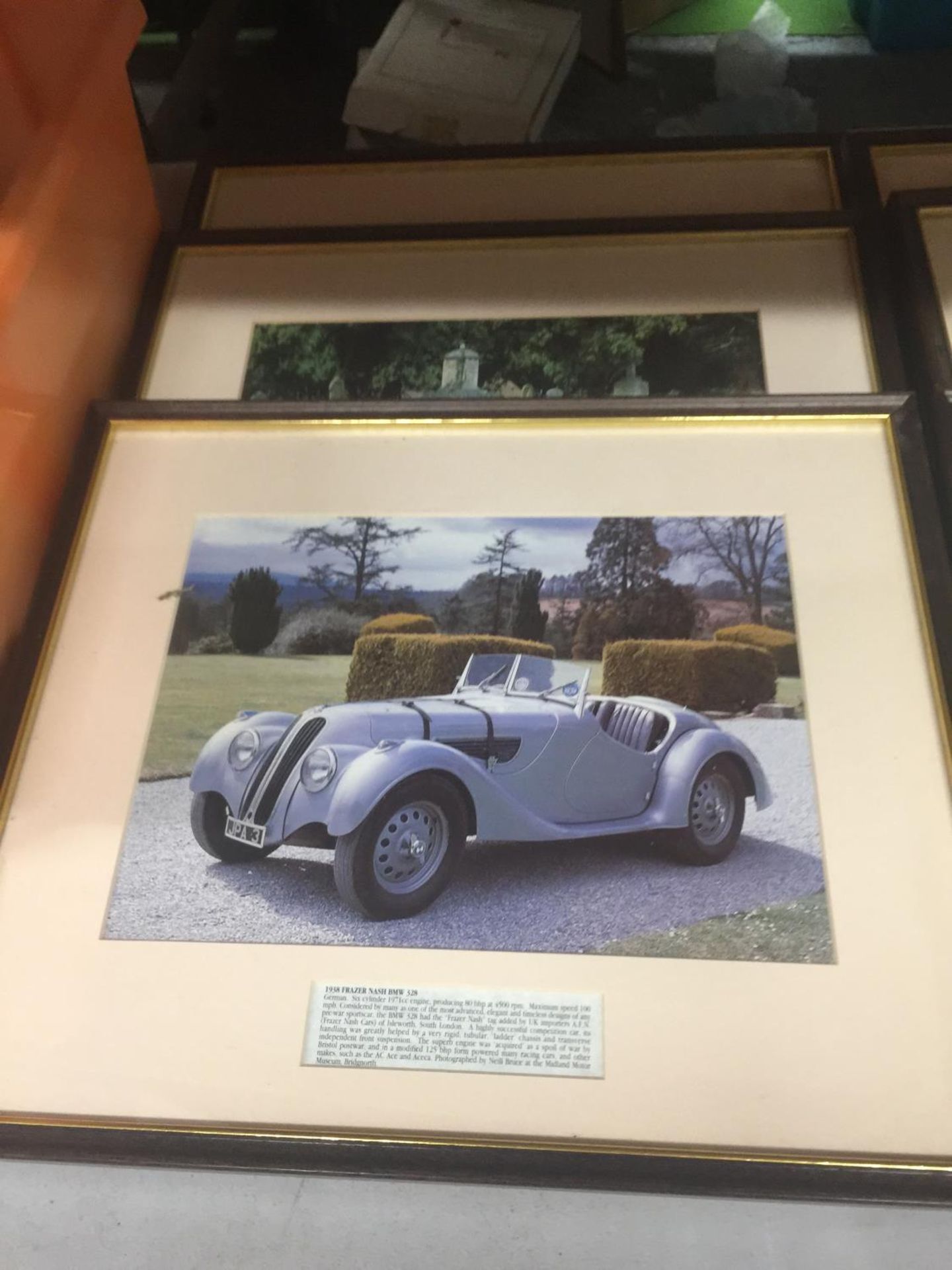 A SET OF TEN MATCHING FRAMED AND GLAZED PRINTS OF CLASSIC CARS - Image 2 of 3