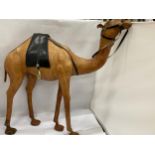 A LARGE VINTAGE LEATHER CAMEL ANIMAL FIGURE, HEIGHT 60CM, WIDTH 59CM