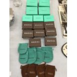 A QUANTITY OF EMPTY JEWELLERY BOXES AND POUCHES MARKED TIFFANY AND GUCCI