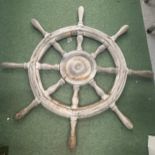 A LARGE VINTAGE WOODEN SAILING BOAT STEERING WHEEL