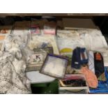 A COLLECTION OF EMBROIDERY ITEMS TO INCLUDE BLANKETS, GLOVES, SOCKS , PICTURES ETC