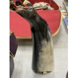 A CARVED HORN FIGURE OF A PENGUIN, HEIGHT 20CM