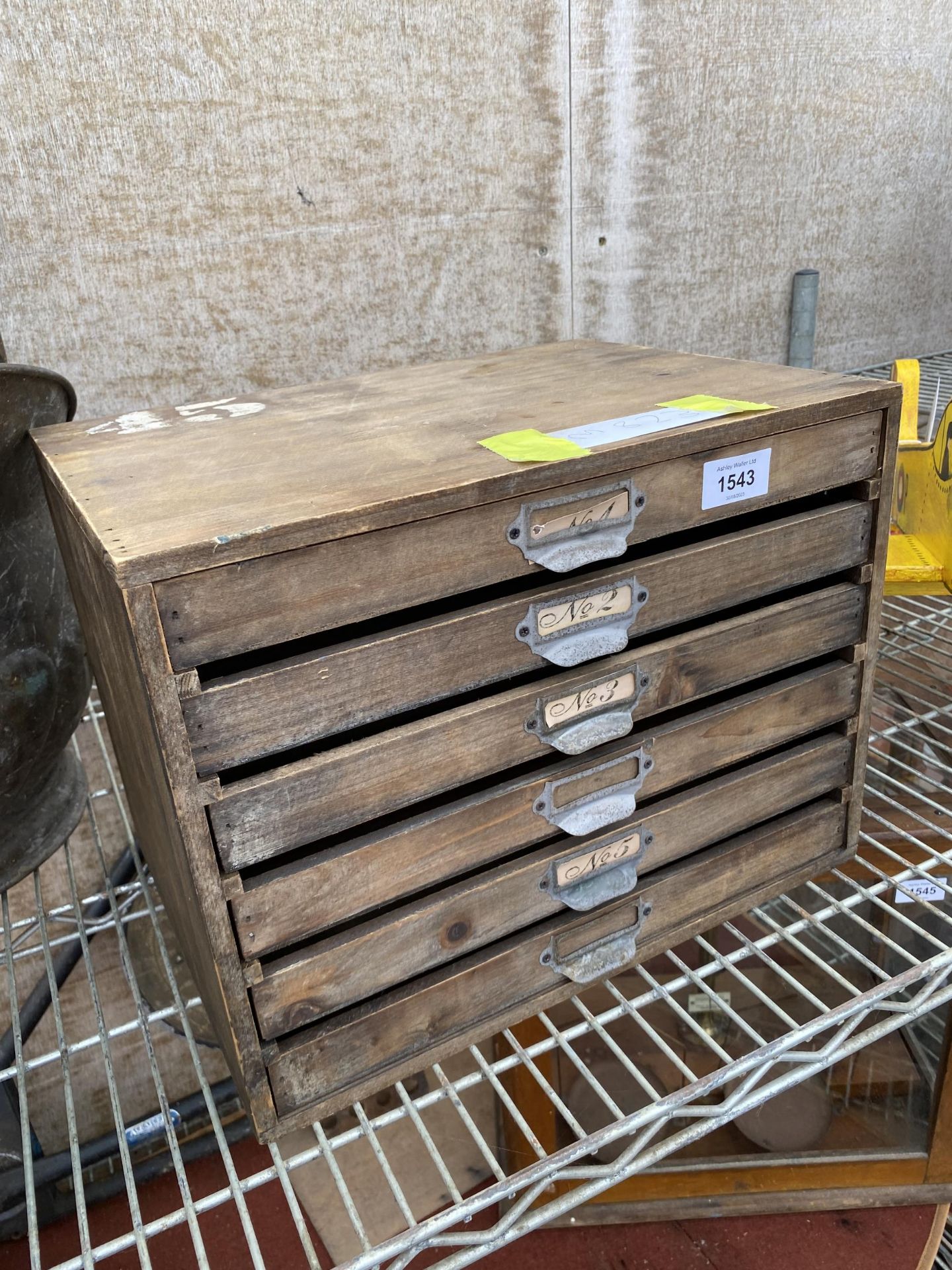 A MINIATURE WOODEN SIX DRAWER FILING CHEST