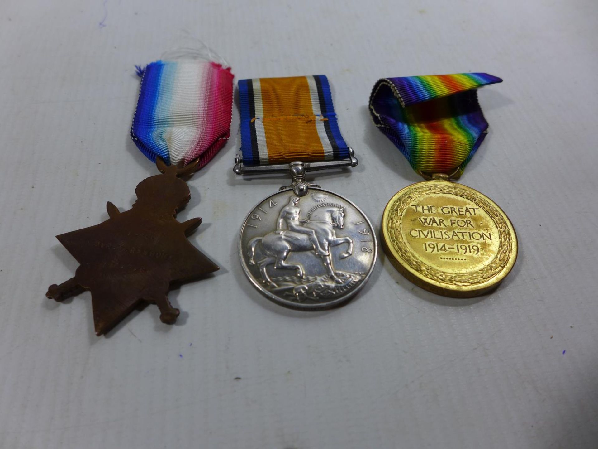 A WORLD WAR I TRIO MEDAL GROUP AWARDED TO 5-866 DRIVER E RAWSON OF THE ARMY SERVICE CORPS - Image 4 of 4