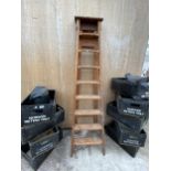 A VINTAGE EIGHT RUNG WOODEN STEP LADDER DATED 1960 AND BELIEVED TO BE FROM NORWEB