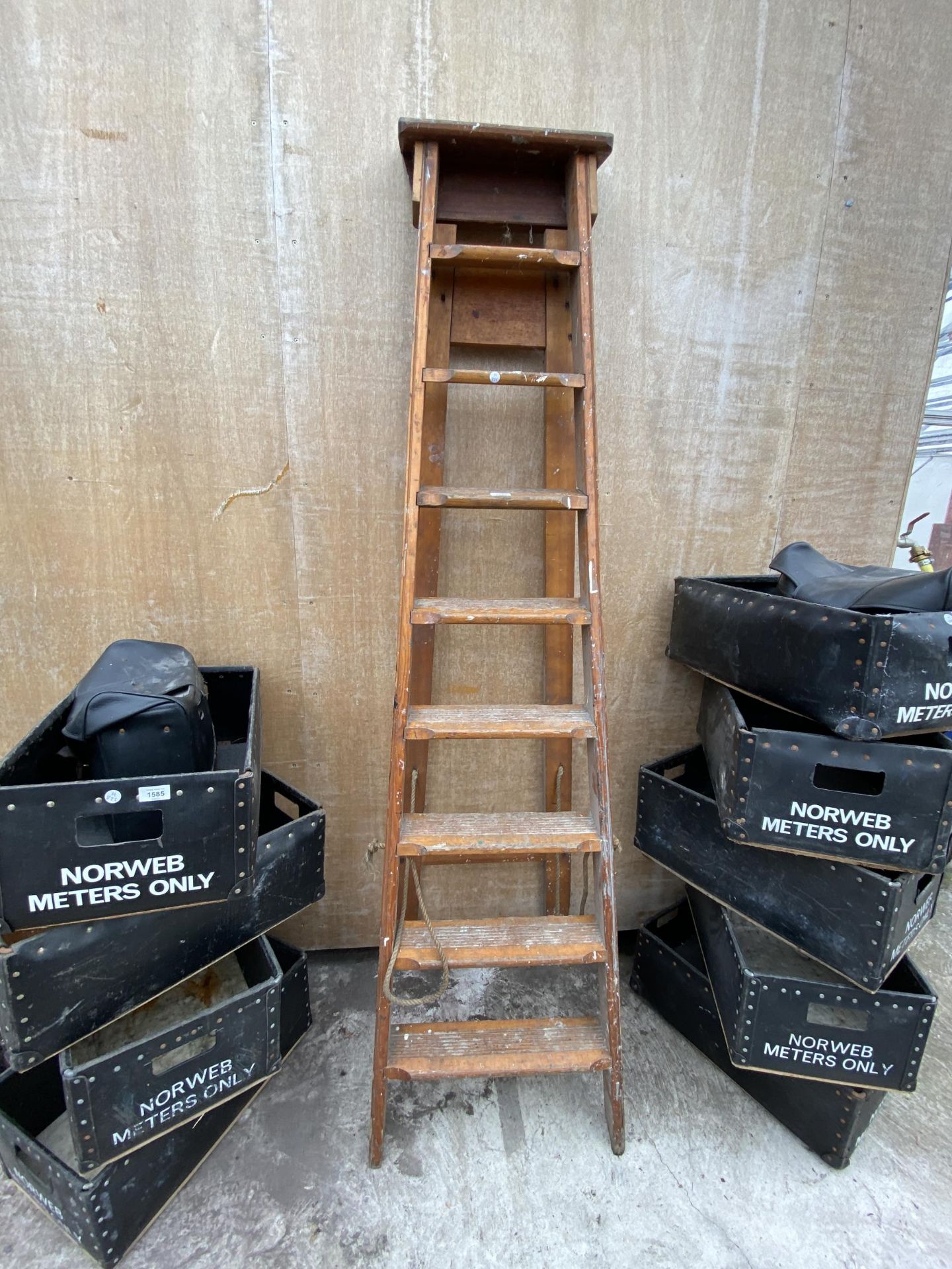 A VINTAGE EIGHT RUNG WOODEN STEP LADDER DATED 1960 AND BELIEVED TO BE FROM NORWEB