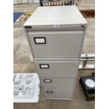 A TRIUMPH FOUR DRAWER METAL FILING CABINET