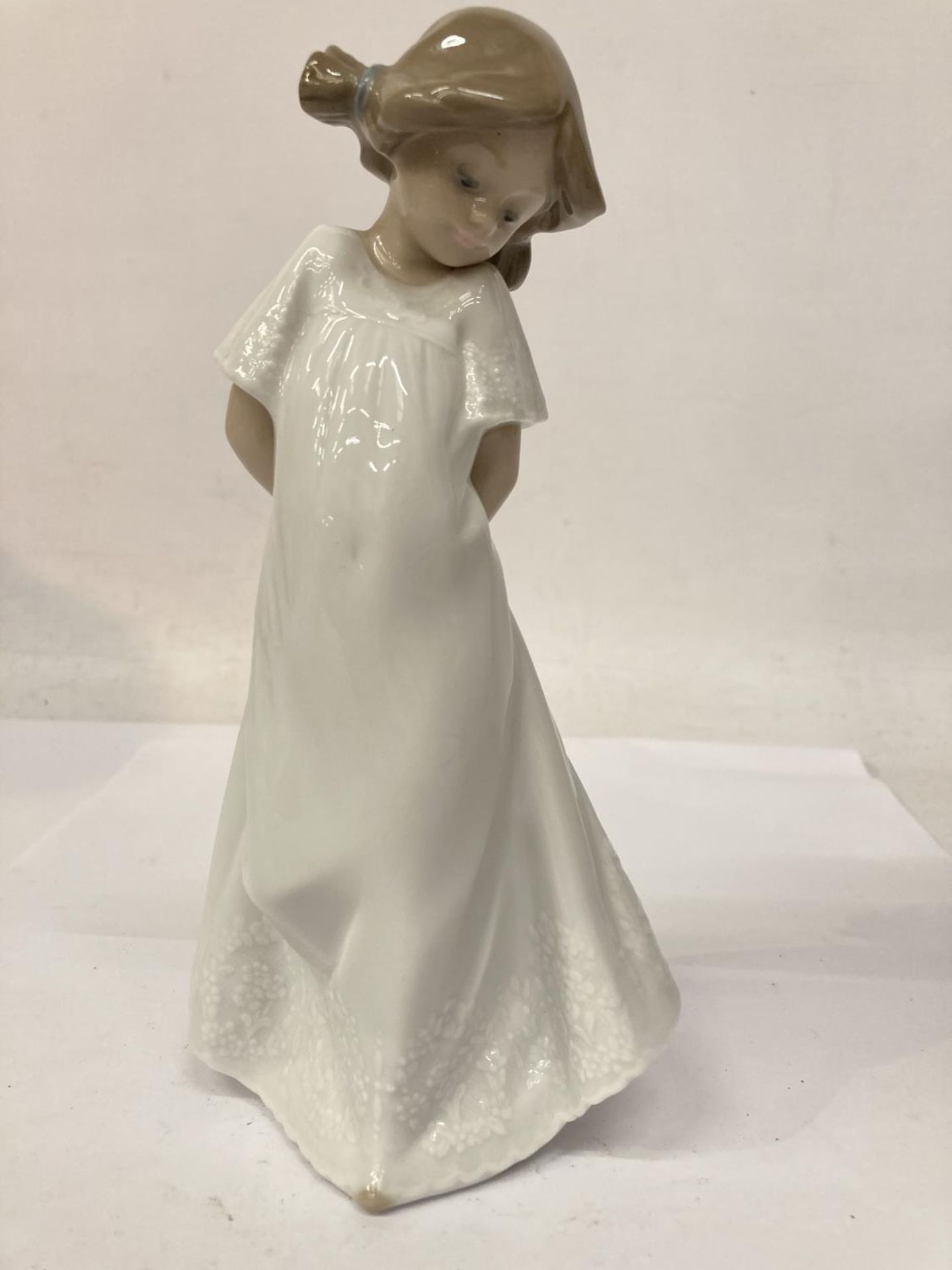 A NAO GIRL IN GOWN FIGURE