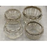FOUR HALLMARKED SILVER RIMMED POTS
