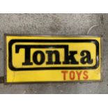 A TONKA TOYS ILLUMINATED LIGHT BOX SIGN 63CM X 32CM