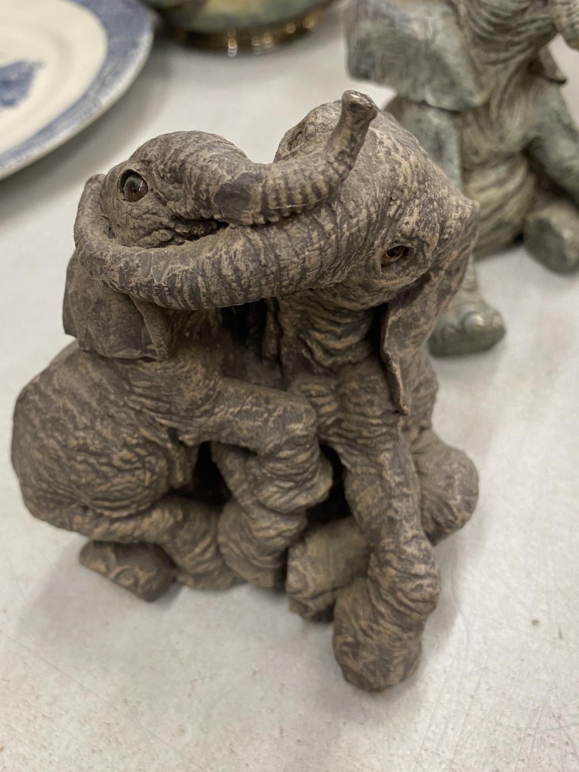 A COLLECTION OF RESIN ELEPHANTS - 8 IN TOTAL TO INCLUDE TUSKERS, RUFF & TUMBLE, HERD, ETC., - Image 2 of 5