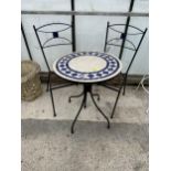A TILE TOPPED ROUND BISTRO TABLE WITH TWO FOLDING CHAIRS