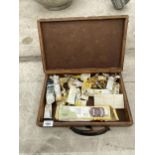 A WOODEN STORAGE BOX AND AN ASSORTMENT OF ARTISTS PAINTS