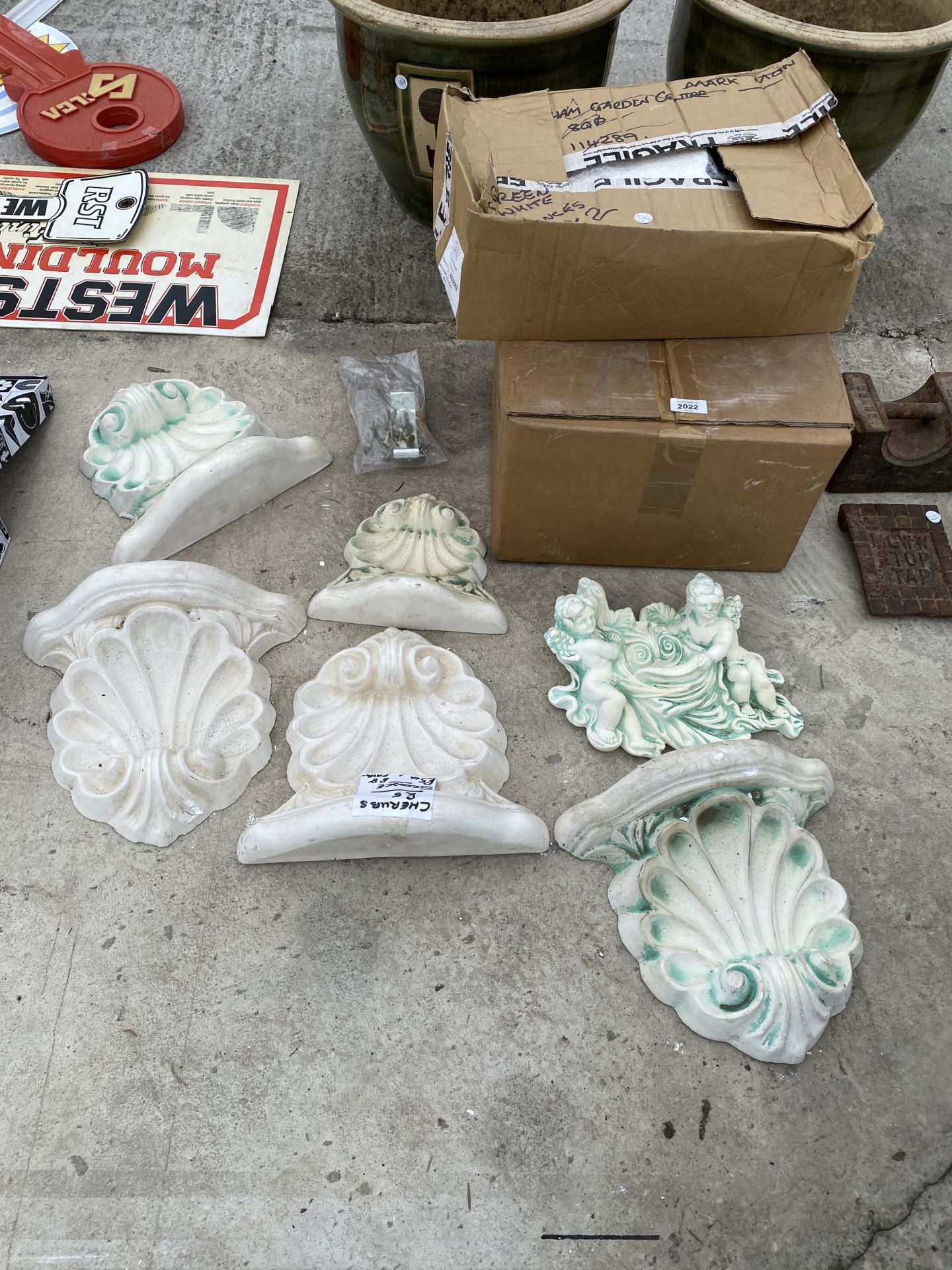 AN ASSORTMENT OF WALL SCONCES AND CHERUB WALL PLAQUES