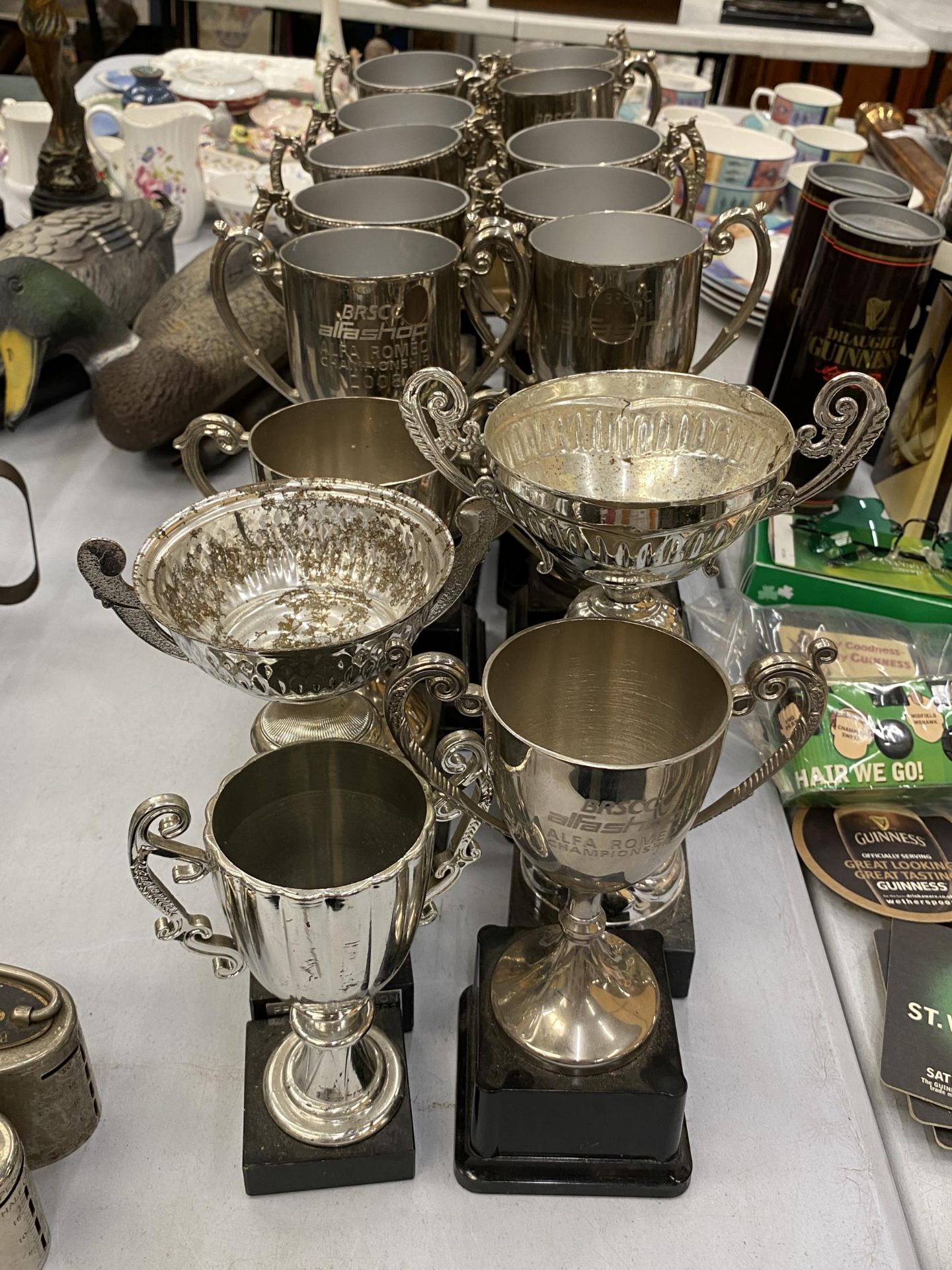 A LARGE COLLECTION OF CUPS AND TROPHIES - 16 IN TOTAL