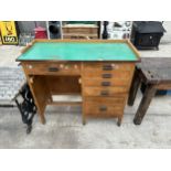 A VINTAGE WOODEN WORK STATION/DESK WITH SIX DRAWERS