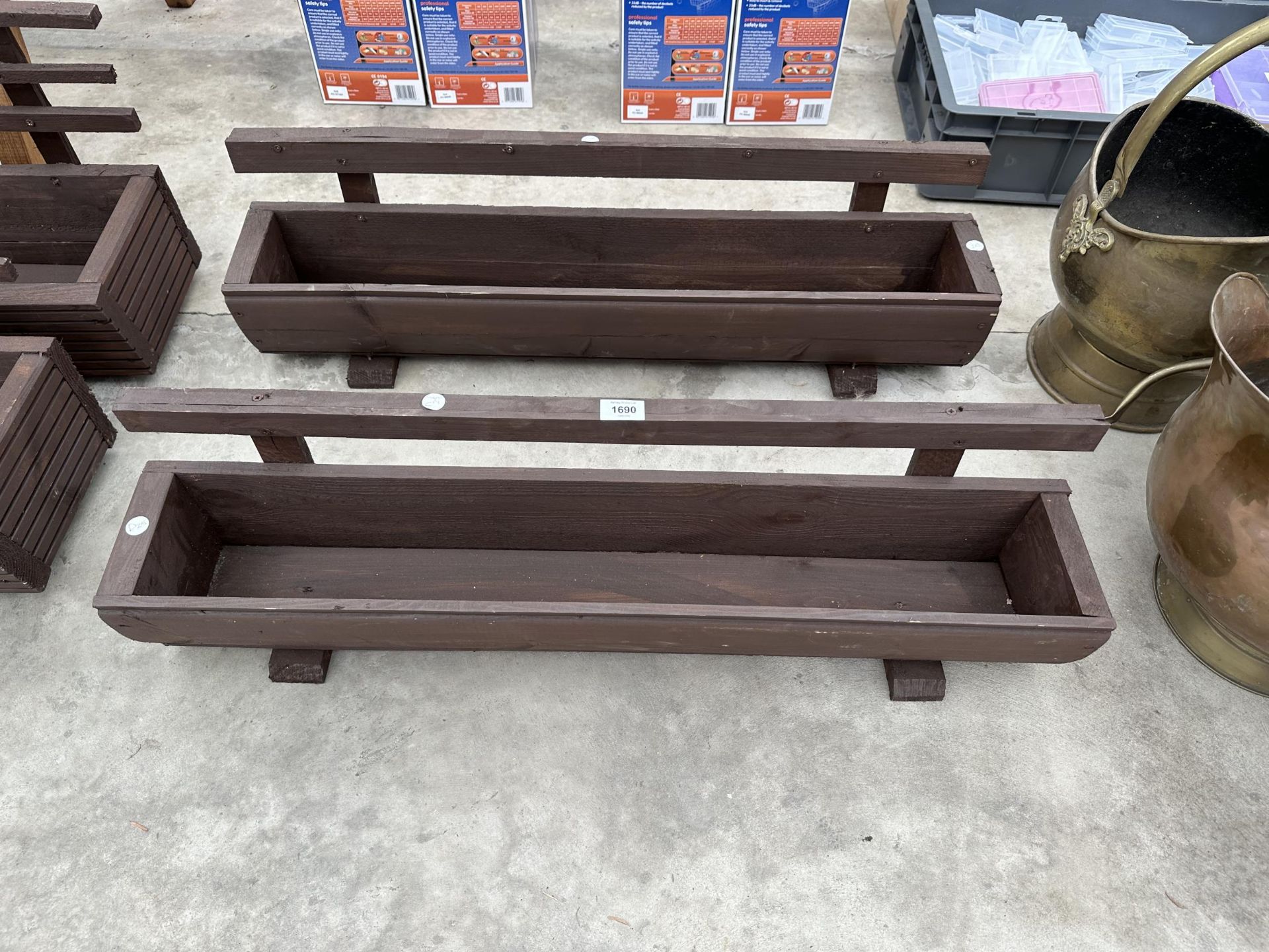 TWO WOODEN TROUGH PLANTERS WITH TRELIS BACKS