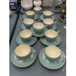 A QUANTITY OF DENBY CUPS AND SAUCERS IN GREEN