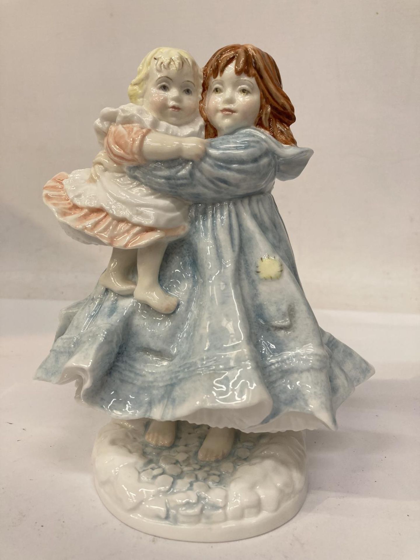 A ROYAL WORCESTER LIMITED EDITION 'LOVE' FIGURE