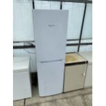 A WHITE HOTPOINT UPRIGHT FRIDGE FREEZER