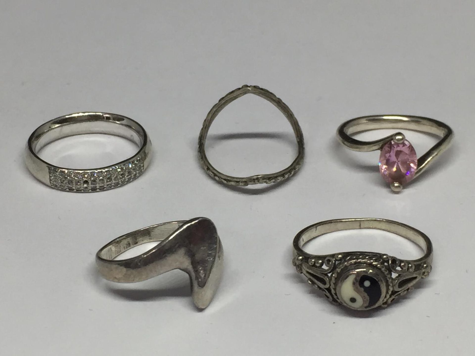 FIVE SILVER RINGS