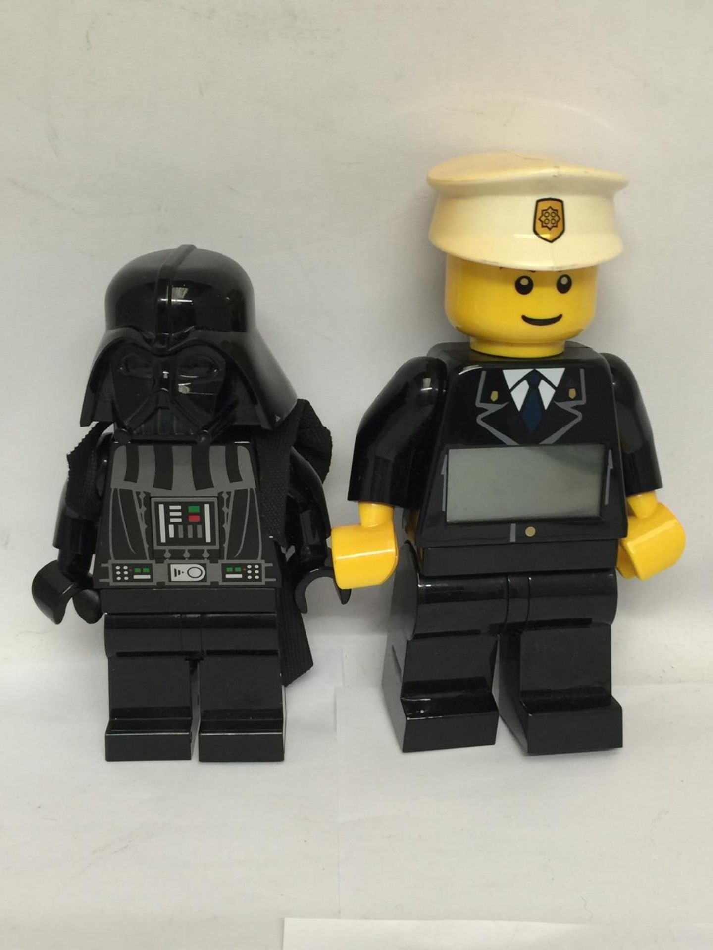 TWO LARGE LEGO MINI-FIGURE BATTERY OPERATED DIGITAL TOYS - A DARTH VADER TORCH AND A POLICEMAN ALARM