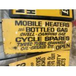 A WOODEN 'MOBILE HEATERS AND BOTTLED GAS' SIGN