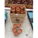 A LARGE QUANTITY OF TERACOTTA PIGEON POTS
