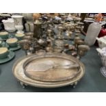 A LARGE QUANTITY OF VINTAGE SILVER PLATED ITEMS TO INCLUDE GALLERIED TRAYS, GOBLETS, CANDLEABRAS,