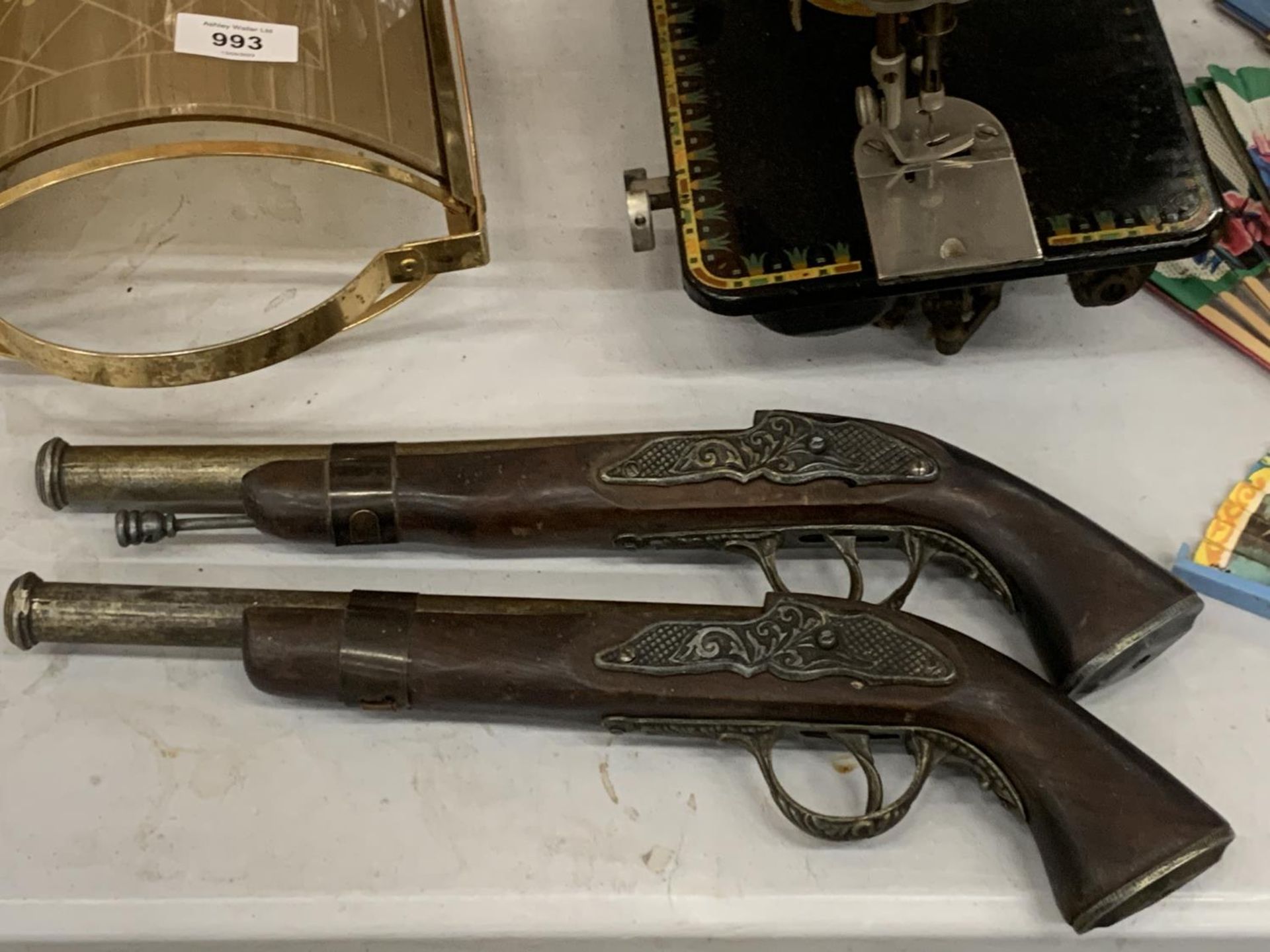 A PAIR OF VINTAGE STYLE ORNAMENTAL PISTOLS