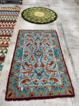 TWO PATTERNED RUGS