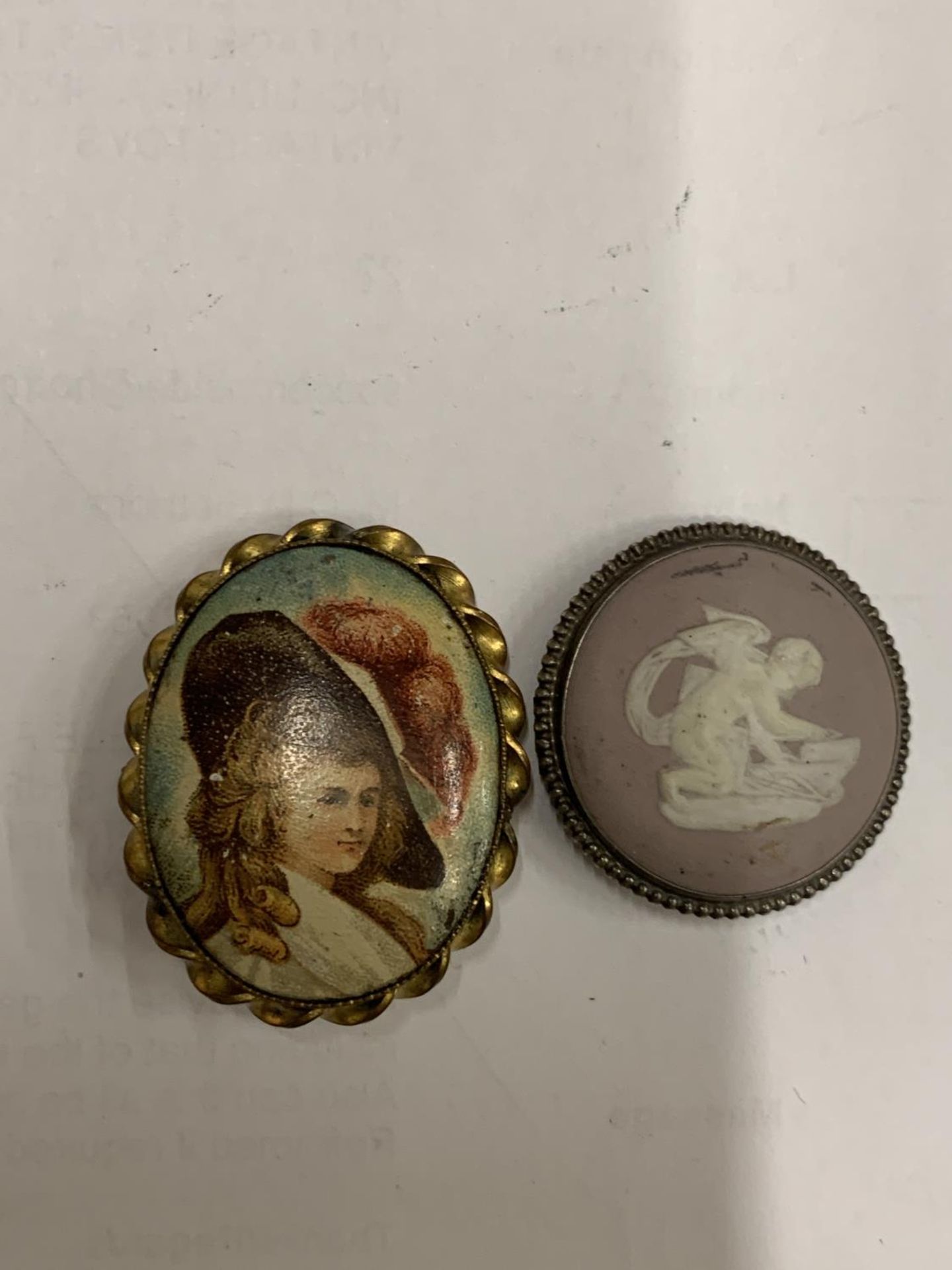 TWO BROOCHES TO INCLUDE A PURPLE WEDGWOOD JASPERWARE